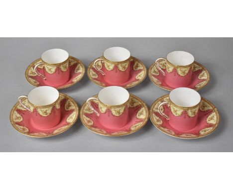 A Set of Six Royal Worcester Coffee Cans and Saucers Decorated with Gilt Swag on Pink Ground 