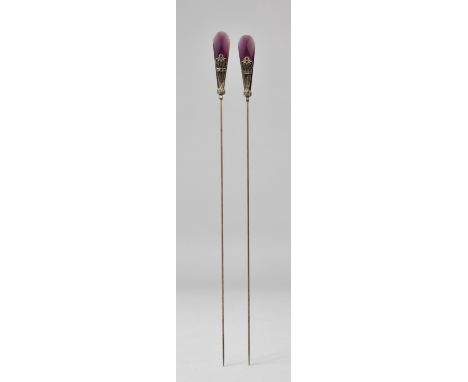 A Pair of Early 20th Century Continental Hat Pins having Amethyst Coloured Glass, White Metal and Paste Stone Tops (Most Past