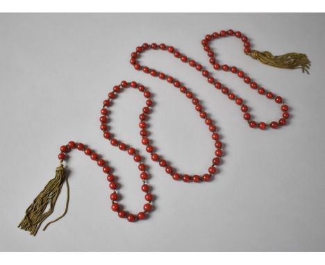 A Very Long and Rare Early 20th Century Faturan Bead Necklace, 178cms Long including Metal Tassels, All Beads in Varying Cher