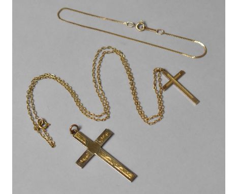 A 9ct Gold Crucifix on Yellow Metal Chain, A 9ct Gold Bracelet and a Gold on Silver Large Crucifix Pendant. Total Weight 6.2g