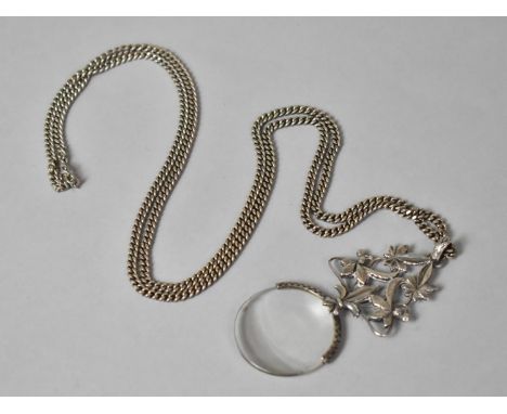 A Silver Chain with White Metal Mounted Magnifying Glass having Maple Leaf Mount, Pendant 9.5cms Long 