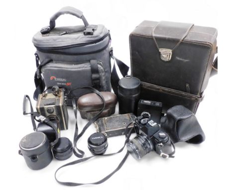 A group of cameras, to include a Coronet 12-20 colour filter box camera, a Kodak folding camera, Yashika camera, canvas camer