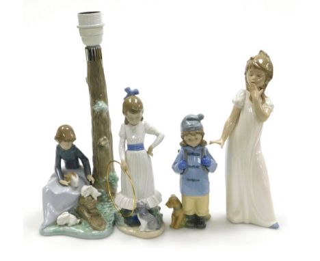 Four Nao porcelain figures, comprising girl in white nightgown yawning, 28cm high, girl in duffel coat with rucksack beside d