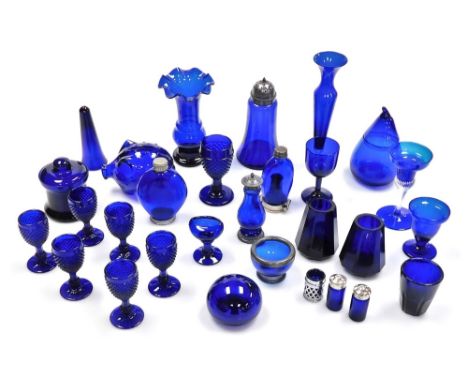 A group of Bristol Blue and other glassware, to include sherry glasses, sugar castor, salts, a flask with silver plated mount