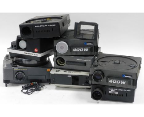 A collection of slide projectors, to include Kodak, Simda, etc. 
