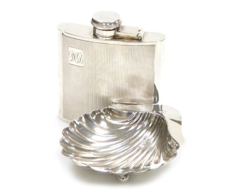 An Edwardian VII silver butter dish, of scallop shell form, raised on three ball feet, Chester 1906, 1.75oz, 9.5cm wide, and 