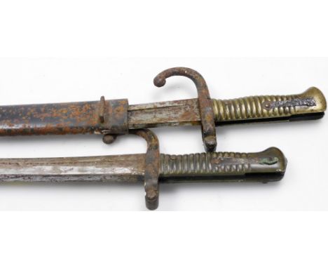 Two late 19thC French St Etienne bayonets, 1866 pattern, one with scabbard, 77cm long. (both AF)