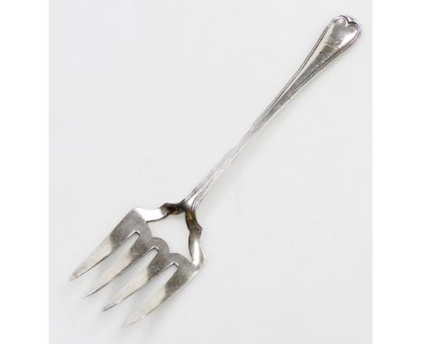 A Victorian silver Old English pattern serving fork, with four prongs and vacant shield shaped section, bearing crest to hand