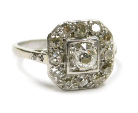 An Art Deco diamond ring, set with old cut diamonds in a cushion setting, in white metal stamped Plat, approx 1ct, size K, 3.