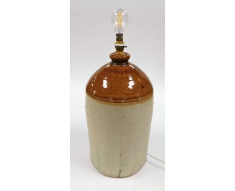 A stoneware flagon, stamped G.W.S Varnish Works Derby, converted to a table lamp, 68cm high. 