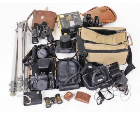 A group of cameras and binoculars, to include a pair of Lieberman and Gortz 15x42 binoculars, Aquilus 10x35 binoculars, a Zen
