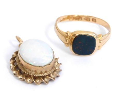 A lady's 18ct gold and bloodstone set signet ring, size J,  1.9g, together with an opal and 9ct gold oval pendant, 1.8g. (2) 