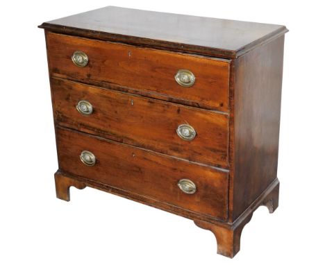An early 19thC mahogany and cross banded chest, of three drawers, the top with a moulded edge, brass lion mask ring handles, 