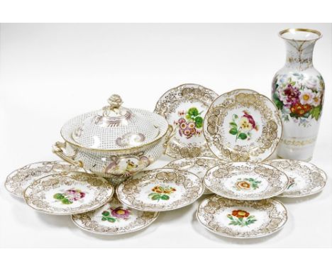 A set of ten 19thC porcelain dessert plates, with a shaped and pierced border, decorated centrally with differing flowers sur