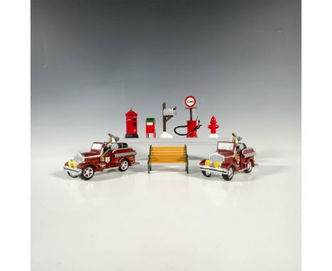 This set features 2 vibrant firetrucks, a charming wooden bench, a silver mailbox, a modern and vintage postbox, a classic fi