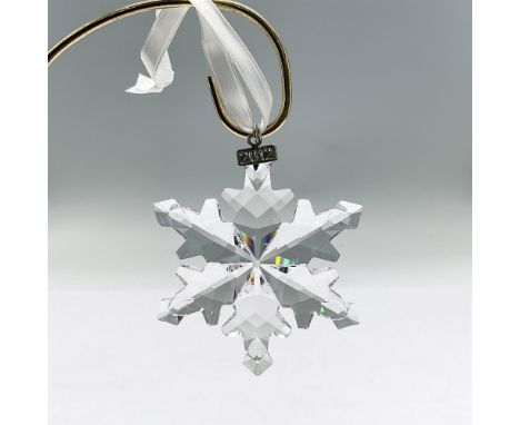 Star or snowflake shaped tree ornament in clear faceted crystal. Swarovski mark. This item has its original box: 5.75""L x 6.