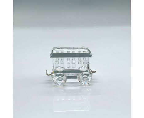 Modelled as a clear crystal train car to carry passengers. Swarovski mark. This item has its original box: 3.75""H x 3.25""di