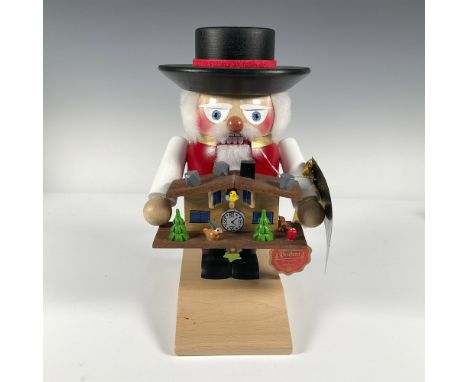 Traditionally, nutcrackers were given as keepsakes to bring luck to the family and protect the home. This nutcracker is weari