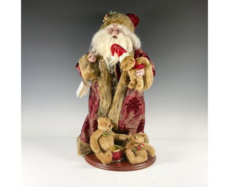 Limited edition stately Santa in a damask red overcoat surrounded by teddy bears. Certificate of Authenticity attached. Dimen