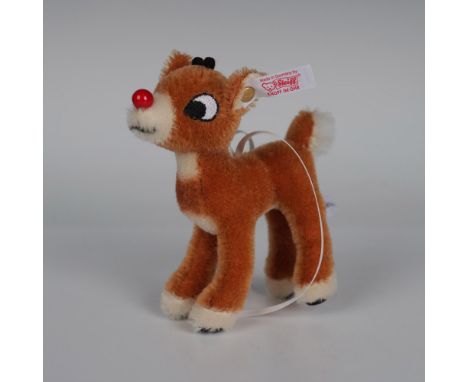 Rudolph, crafted from the finest tan mohair, retains its original Steiff ear pin with catalog number. This Limited-Edition Mo