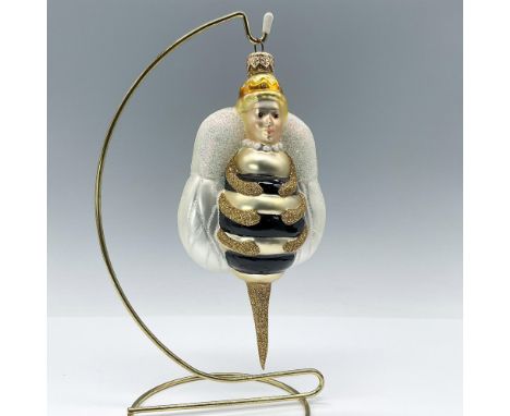 This beautiful hand-crafted ornament was part of the Spring Line. It features a woman portrayed as a pearl and gold-colored b