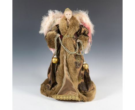 Lovely ceramic free standing angel dressed in long sable gown with long fur trimmed overcoat, carrying long beaded rope with 