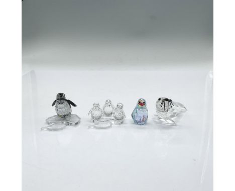 Six faceted crystal figures of penguins, seal and Lovlots Johnny the Penguin in Light Azore Aurore Boreale crystal. Includes 