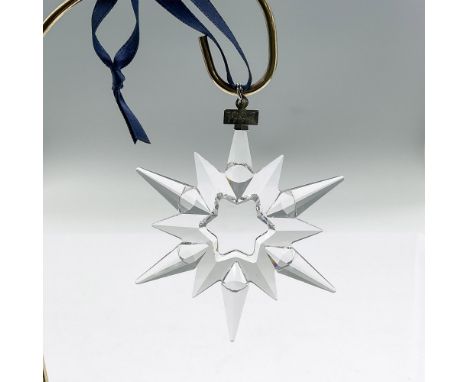 Star or snowflake shaped tree ornament in clear faceted crystal. Swarovski mark. This item has its original box: 5.75""L x 6.