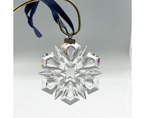 Star or snowflake shaped tree ornament in clear faceted crystal. Swarovski mark. This item has its original box: 5.75""L x 6.