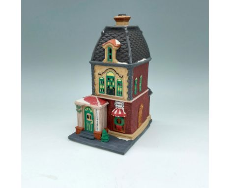 Part of the Christmas In the City Series. Hand painted porcelain figure of a shop that sells neckties, hats, and shoes. Depar