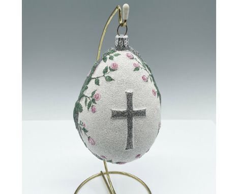 This ornament is beautifully decorated with sparkling glitter and showcases vining roses encircling a silver glitter cross. I