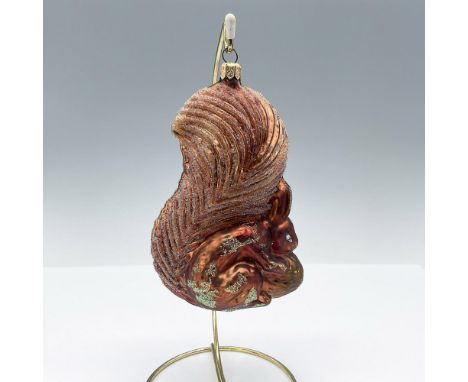 Behold a charming brown squirrel, its fluffy tail grasping the nut it just discovered. Hand-painted eyes add personality, whi