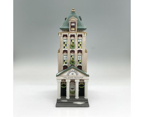 Handpainted matte porcelain three-story stock exchange building. Part of the Christmas in the City Village Series. Department