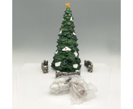 Hand painted holiday tree that lights with plug in accessory. Colored in deep green with white for snow effect, star at top o