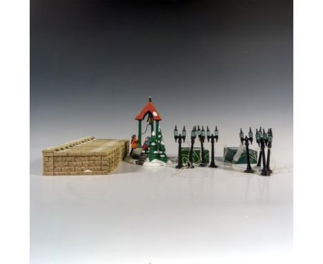 An assortment of small hand painted porcelain figure accessories. Includes 1 piece Christmas Bells a 1996 Special Event Piece
