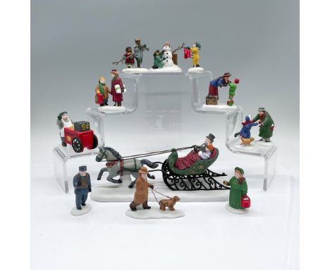 An assortment of small hand painted porcelain figure accessories. Includes 1 piece Dashing Through The Snow, set of 3 Welcome