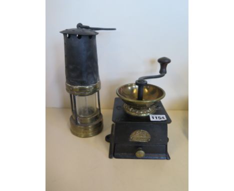 A WM bullock and Co coffee grinder, brass and cast iron with wooden handle, approx 14cm square, overall height 18cm, together