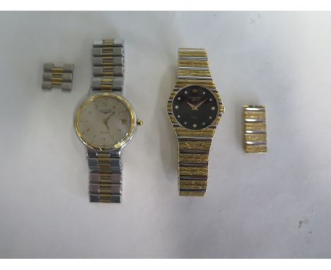 A Longines ladies Bi metal Conquest Quartz wristwatch with calendar 34mm wide including button, some usage wear, running in s