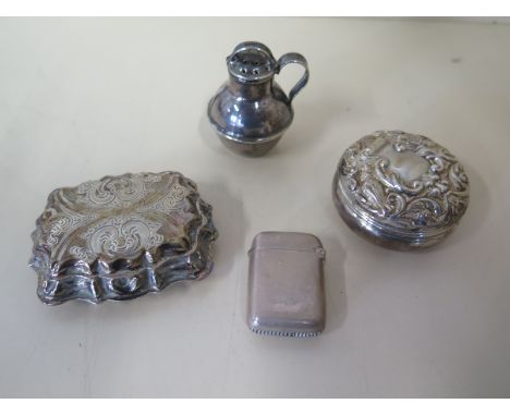 A small silver snuff box, a silver pot, a miniature silver vesta 3cm tall, and a silver Guernsey can pepper 4cm tall, total w