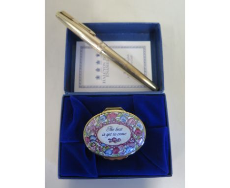 A Halcyon Days enamel pot and a Parker pen, pot as new, wear to pen 