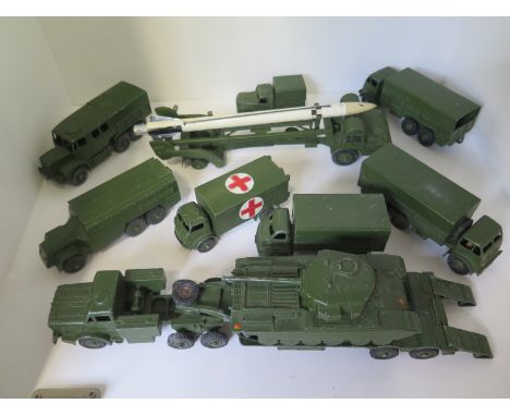 Ten Dinky toy military vehicles including missile erector, all with play wear 