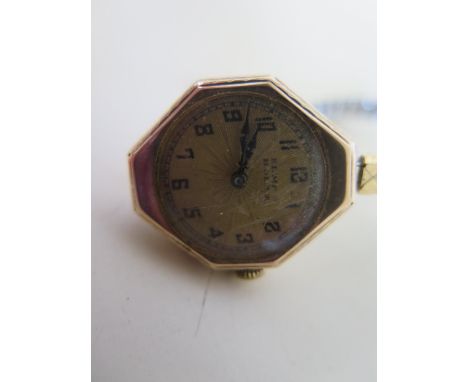 A vintage 9ct yellow gold Rolex manual wind wristwatch on a plated sprung strap case, number 12517, dial signed Kemps Rolex g