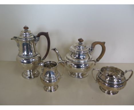 A silver four piece tea service, Birmingham 1930/31 and  1931/32 maker Adie Brothers, total weight approx 53 troy oz, minor d