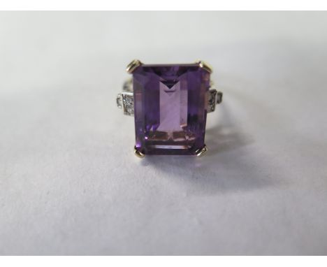 A 9ct yellow gold amethyst and diamond ring, size N/O approx 6.8 grams, amethyst approx 15mm x 12mm 