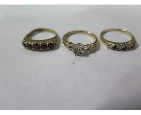 Three 9ct gold rings, sizes J, G, K - roral weight approx 4.9 grams, general usage marks to all 
