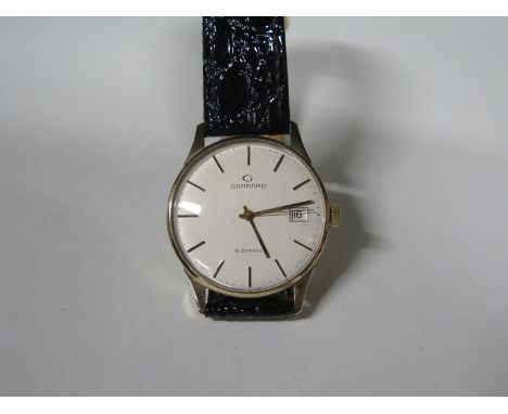 A Gentlemans Gerrard 9ct gold wristwatch, hallmark London 1987 - with engraved presentation text to back, see images for deta