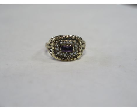 A yellow gold pearl and amethyst ring, presumed to be 9ct, size Q, approx 4.5 grams, one pearl missing, wear consistent with 