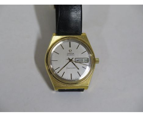A gentlemans Omega Seamaster Automatic wristwatch with silvered dial and calendar, case width including button 36mm, with Ome