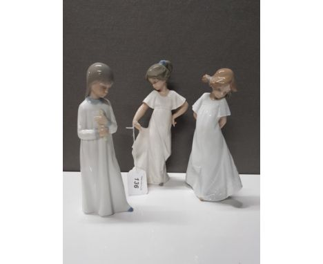 3 ASSORTED NAO FIGURINES