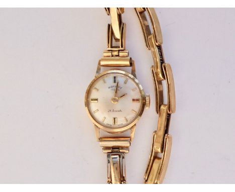 A lady's 9ct gold cased Rotary wristlet watch, having a Swiss-made 21-jewel movement, radially engraved silvered face and bat